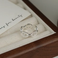 Macro shot of silver pig nose chain ring on vintage wooden jewelry box and card - 925 Silver / Adjustable Open / Silver