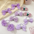 Purple themed kids hair accessories set featuring ribbon bows and pearl flower elastic bands - Purple Charm 10Pcs Set