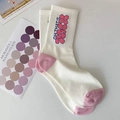 Close-up of white cotton socks with pink heel accents and 'OH THAT'S' printed text - One Size / Vertical Stripe Flower