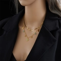 Ensemble de colliers dorés à deux couches avec turquoise, étoile et soleil sur un mannequin - Style Double Couche Oeil Maléfique Turquoise (N1718)