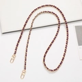 Detail of purple leather woven gold metal chain strap with rotatable lobster clasps - Woven Leather Crossbody Style / Deep purple