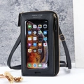 Black touchscreen crossbody phone bag with gold zippers and adjustable strap - Black