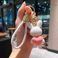 Handmade style white braided bunny keychain featuring a pink heart and golden hardware - Rabbit (B255-10) / Single Piece / White