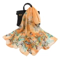 Elegant orange chiffon scarf with butterfly print draped on a stylish handbag - Large Butterfly Yellow