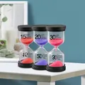 Three-piece hourglass set with black lids featuring 15, 20, and 30-minute timers - 60 Minutes