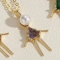 Collar de niña con colgante de circonita púrpura y detalle de perla blanca - Circonita Púrpura