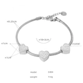 Silver beaded snake chain bracelet with three sparkling crystal heart charms - Heart Inlaid Rhinestone Style (E404) / Silver