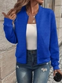 Dettaglio della giacca blu reale con trama a rombi e chiusura a zip - Blu