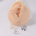 Detail view of double-layer stainless steel ear cuffs on model showing clip-on design - Double Layer with Beads / Steel