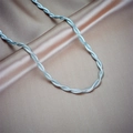 Sleek silver twisted chain necklace with a metallic spiral texture on champagne silk fabric - Spiral Twist Fine Necklace (N2049)