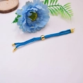 Detailed view of blue woven Milan cord bracelet with 18K gold-plated adjustable slide beads - Lake Blue