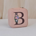 Pink PU leather jewelry box featuring a floral letter B print and secure zipper closure - Print B