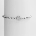 Minimalist elastic beaded bracelet with a polished silver-tone letter N pendant - Silver N