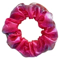 Rose red scrunchie with metallic laser finish and iridescent fabric on white background - Orange Red
