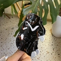 Handcrafted black bear acetate hair claw clip with unique marble texture patterns - Hugging Puppy