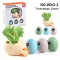 Green Triceratops dinosaur egg toy with rolling base and three colorful mini eggs - Green Triceratops + 3 Dinosaur Eggs