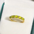 Elegant gold ring featuring seven sparkling light green stones set in a row design - Seven Light Green Cat's Eye Stones Row Inlay Style (金色27)
