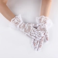 Elegant white lace gloves with vintage floral patterns and layered ruffle wrist detail - Child Size White