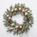 Christmas wreath with pink gold ornaments and pine cones on a white background - Warm Luxury Pink Gold Ornament Style (H642)