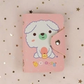 Pink PU leather card holder featuring a cute cartoon dog and secure snap fastener - Pink Base White Dog
