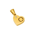 Close-up of heart-shaped gold pendant with round gemstone and hollow circle detail - Letter O