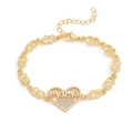 Elegant 18K gold plated MOMO heart bracelet with sparkling zircon crystals on white background - MOMO Heart Pendant
