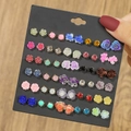 Set di orecchini a lobo a rosa in resina colorata con strass su carta nera - 12 Paia Rosa Sfumata con Strass