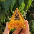 Handmade Orgone pyramid with golden Buddha statue, gold leaf flakes and resin crystal - Style 13