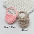 Detail of handmade crochet mini bags in peach pink and khaki colors with woven texture - Peach Pink