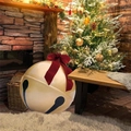 Inflatable gold Christmas bell ornament with red bow on cozy plush carpet background - 60CM Bell Ball with Bow