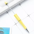 DIY plastic beaded ballpoint pen in bright yellow finish with metallic silver nib - Glitter Morandi Yellow