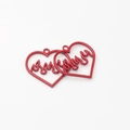Close-up of two red hollow heart charms with inner flame pattern for DIY jewelry making - Red