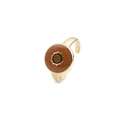 Detail of gold-plated open ring featuring a sunburst motif on a brown enamel surface - Adjustable Open / Sun Orange