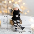 Poupée elfe de Noël en pull noir à étoiles avec jambes rayées et ailes argentées - Type E / Elfe à Longues Jambes Noir et Blanc (Assis)