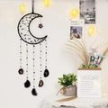 Black moon dream catcher with agate slices and stars in a warm interior setting - Obsidian Glow Black