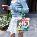 Canvas bucket bag with anime girl illustration and green handles on a stone background - Happy Alexander Girl