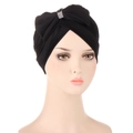 Gros plan d'un turban noir avec un grand nœud et des accents de strass scintillants - Noir