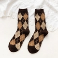 Brown and beige argyle wool blend socks for winter laid on white knit fabric - One Size / Coffee