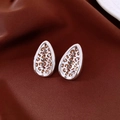 Macro shot of silver metal teardrop earrings with bronze leopard print on silk - Silver Waterdrop Leopard Style / Silver (Silver Pin)
