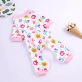 Close-up of baby romper with animal prints, pink ribbed cuffs and cotton texture detail - Pet Four-legged Pajamas - Red Horse Pajamas