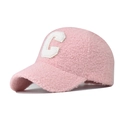 Close-up of pink faux shearling baseball cap with embroidered letter C patch detail - Adjustable / Pink