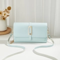Minimalist light blue leather crossbody bag with elegant gold hardware and textured finish - Light Blue