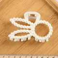 Large butterfly pearl hair claw clip with white faux pearls on cream resin base - Hollow Rabbit