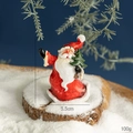 Vintage resin Santa figurine with green tree, 7.5cm tall, handcrafted Christmas ornament - Resin Santa Claus with Christmas Tree Style