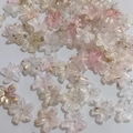 Macro shot of colorful mini five-petal flower beads with gold foil for DIY jewelry making - Gold Foil Mini Flower Color 6