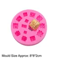 Pink silicone round mold featuring 11 varied gift box shapes for fondant and clay crafts - Pink