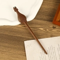 Classic carved sandalwood hair pin with turquoise inlay on a vintage paper background - Turquoise Inlay Style (F2023890)