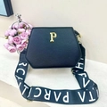 Chic black hexagonal tote bag with golden P logo and wide branded fabric shoulder strap - Black