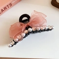 Detail of black shark hair clip with pink mesh bow and inlaid white pearls and diamonds - Artificial Pearl Rhinestone Hair Claw / Pink Gauze Bow