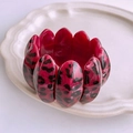 Red and black leopard print resin beaded bracelet with glossy finish on a ceramic plate - Red Black Leopard Petal Style (53# Bangle - Rose Red)